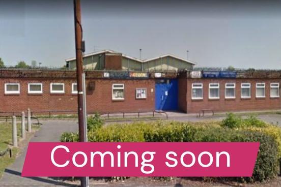 A photograph of Mitchell community centre with an overlay saying Coming Soon.