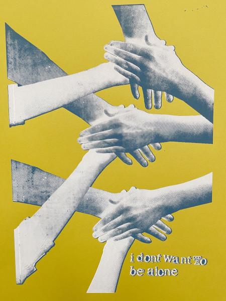 Artwork of a group of hands on top of each other on a yellow background with the text 'I don't want to be alone'